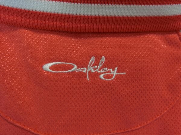 OAKLEY(オークリー) ハーフジップアップシャツ 赤 レディース L A