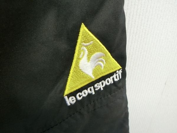 le coq sportif(ルコックスポルティフ) ナイロンパンツ 黒 レディース M A