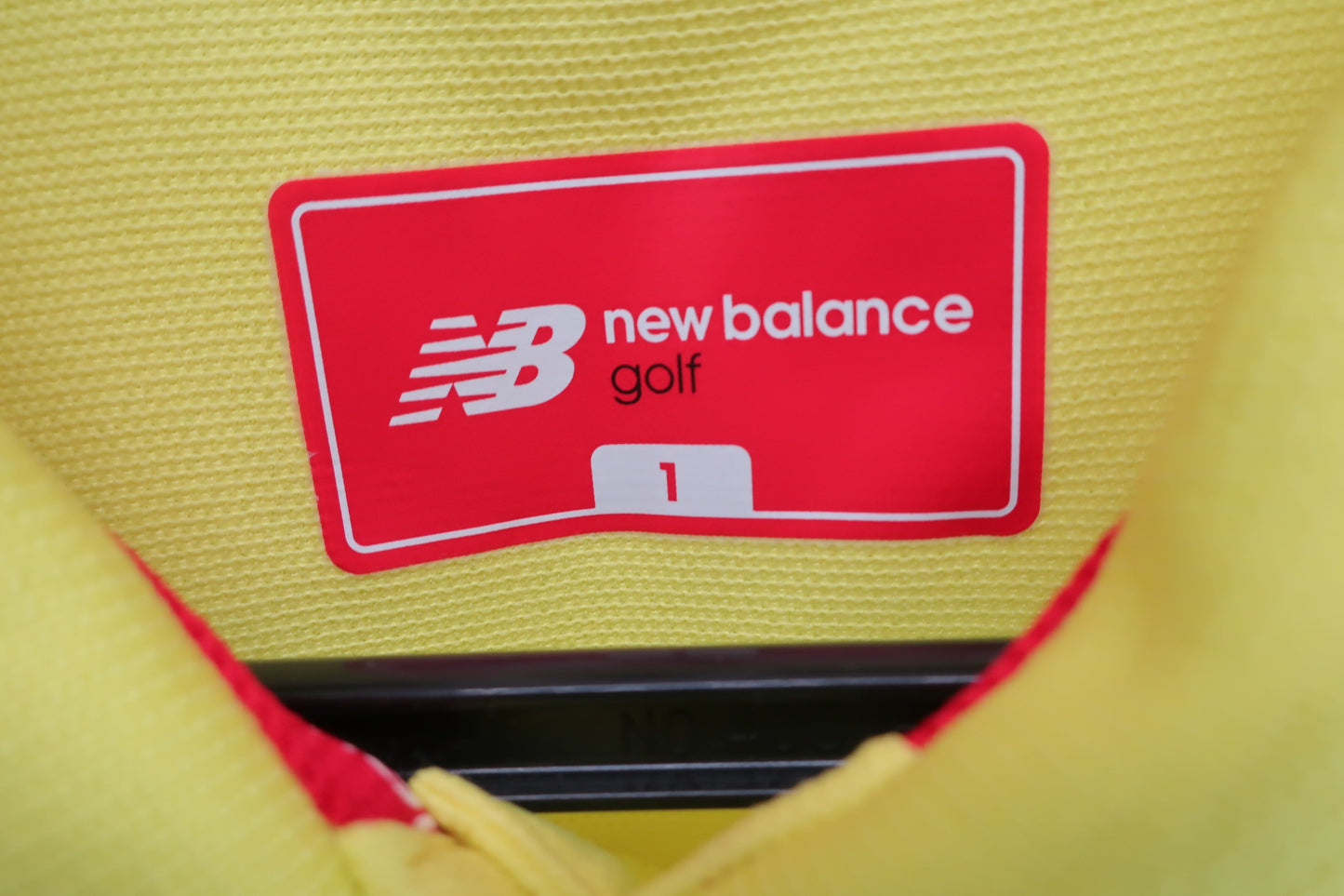 New Balance(ニューバランス) ポロシャツ 黄 レディース 1 B