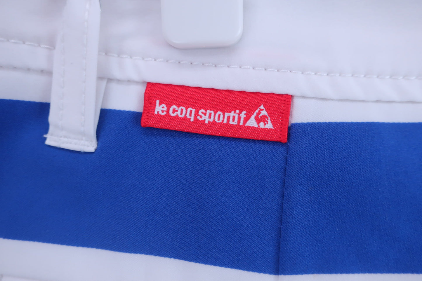 le coq sportif(ルコックスポルティフ) パンツ一体型スカート 白カラフルボーダー レディース 11 A