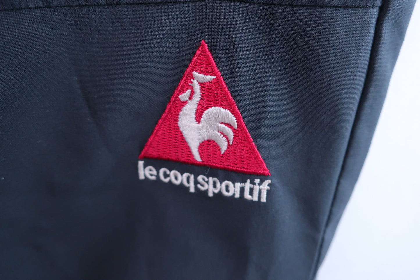 le coq sportif(ルコックスポルティフ) パンツ 黒 メンズ L B