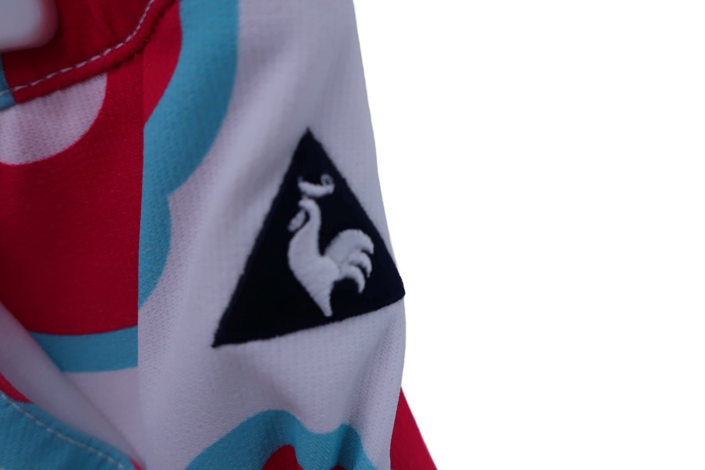 le coq sportif(ルコックスポルティフ) スカート（インナーパンツ付き） 白赤緑花柄 レディース 13 A