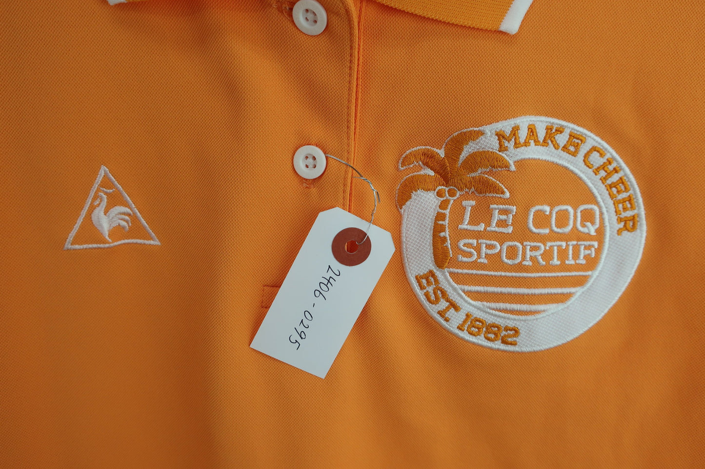 【超美品】le coq sportif(ルコックスポルティフ) ポロシャツ オレンジ レディース M ゴルフ用品 2406-0295 中古