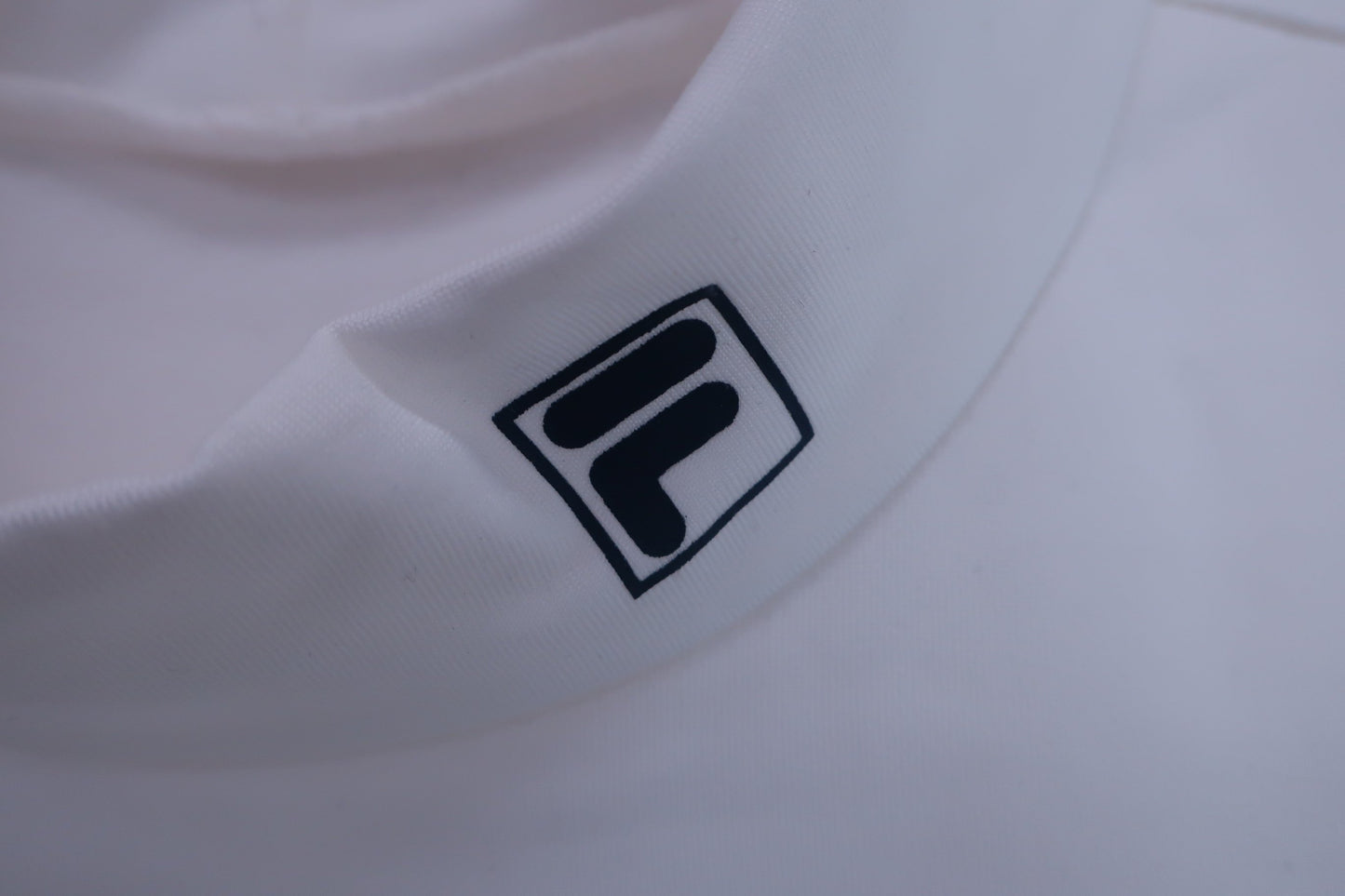 FILA GOLF(フィラゴルフ) 長袖モックネックシャツ 白 メンズ LL B