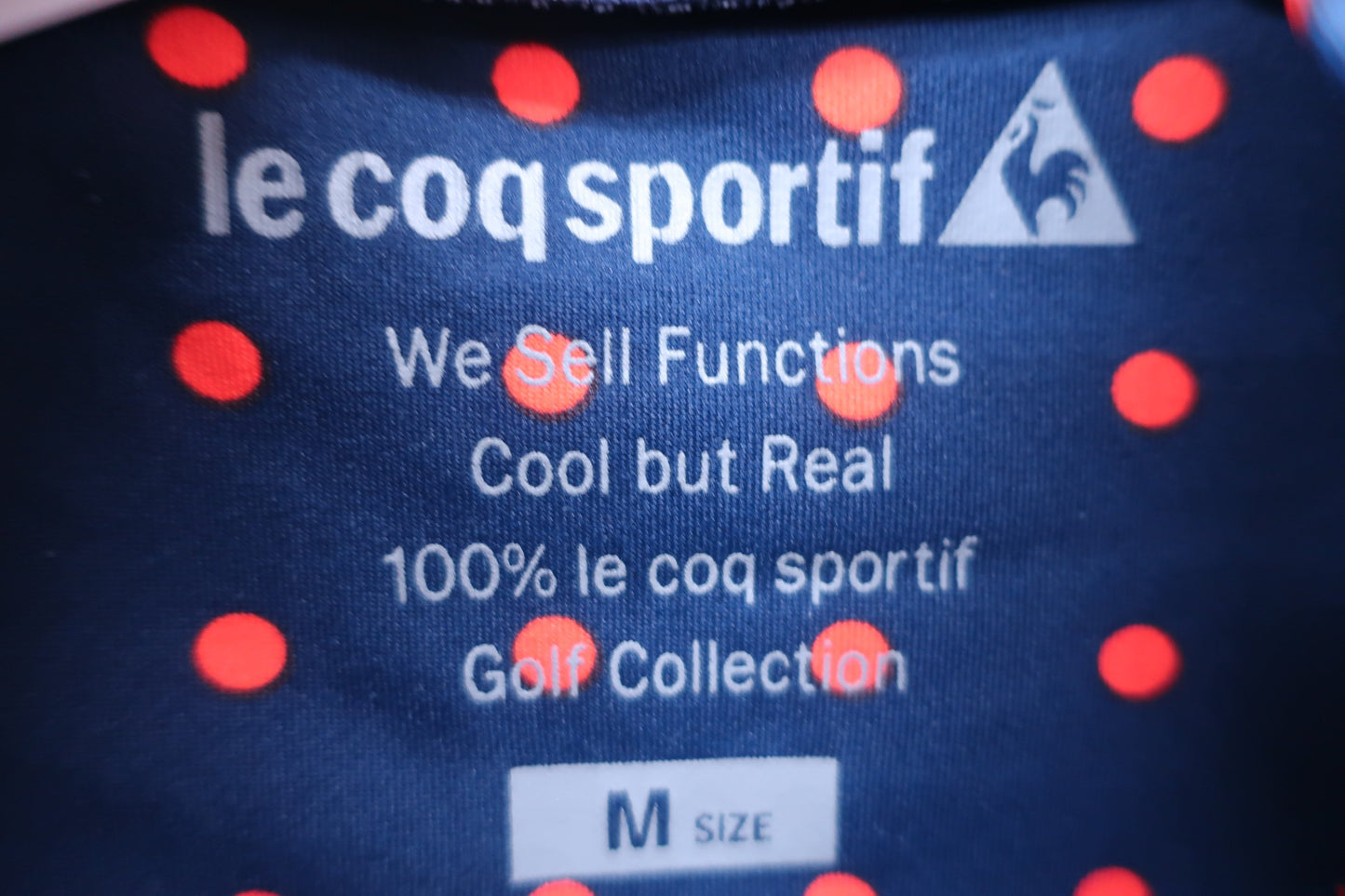 le coq sportif(ルコックスポルティフ) ハイネックシャツ ネイビー赤玉柄 レディース M B