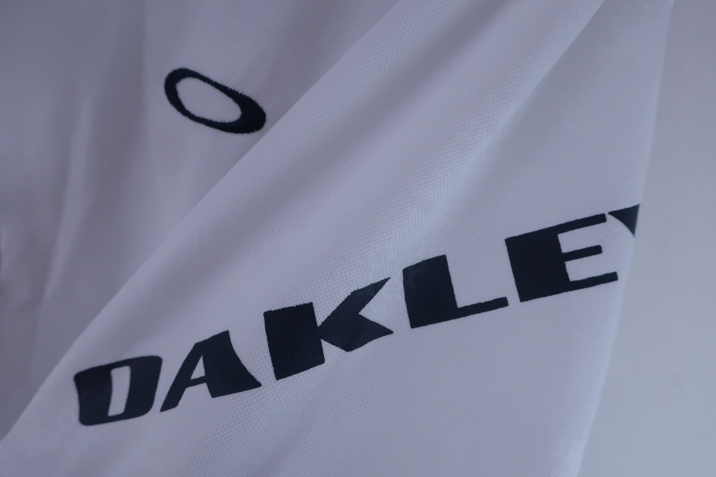 OAKLEY(オークリー) ハーフジップシャツ 白ネイビー メンズ M A