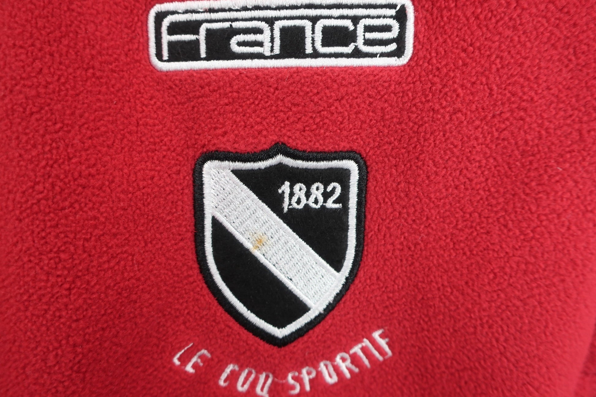 le coq sportif(ルコックスポルティフ) ハーフジップフリース 赤 メンズ L B-4