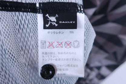 OAKLEY(オークリー) ポロシャツ 黒系 レディース M A-5