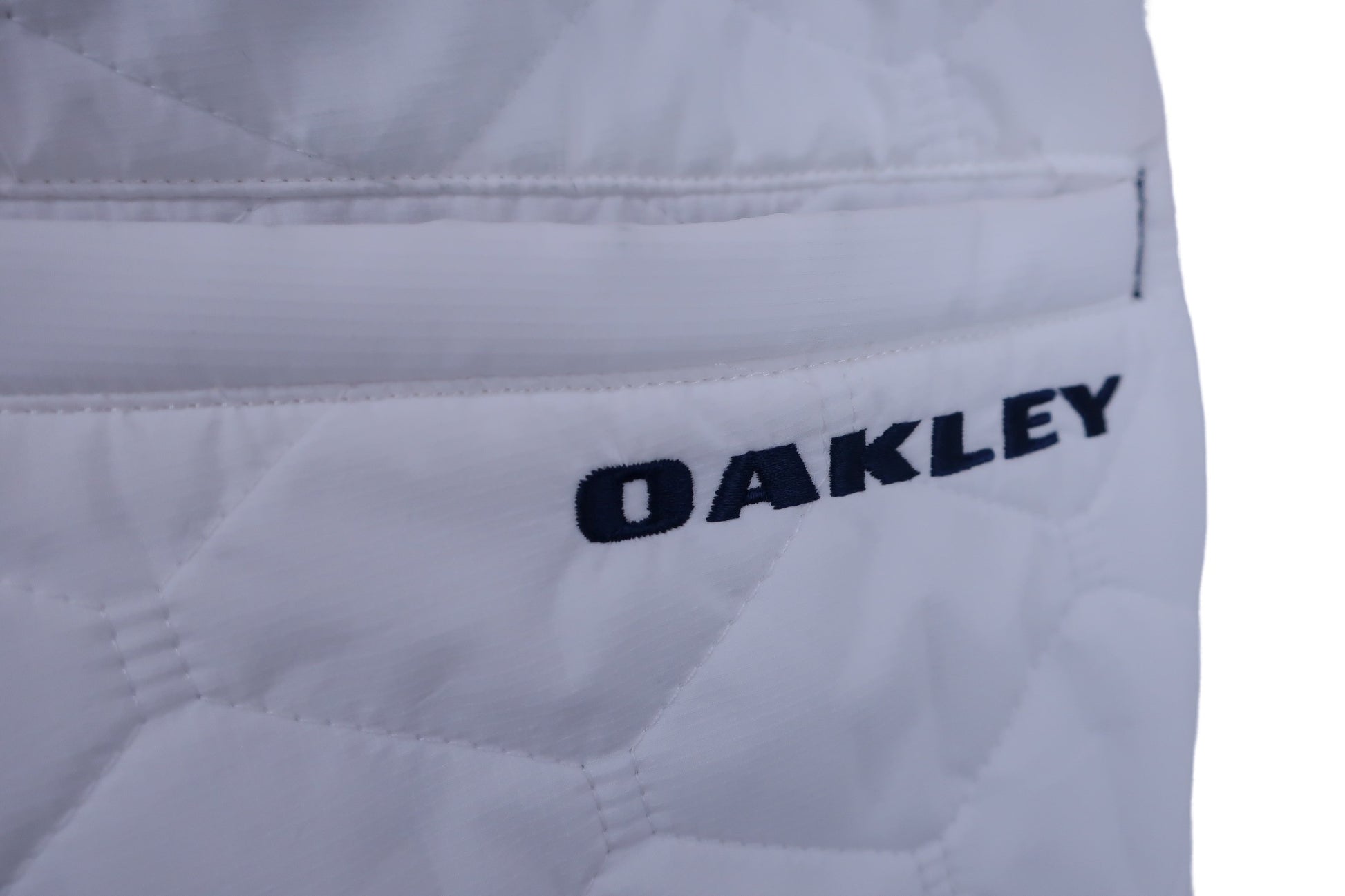 OAKLEY(オークリー) ナイロンパンツ 白 メンズ L B-10