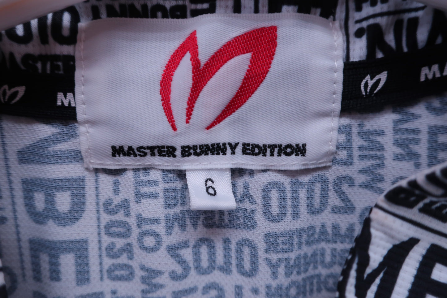 MASTER BUNNY EDITION(マスターバニーエディション) ハーフジップシャツ 白ブランドロゴ総柄 メンズ 6 758-0260805 A-3