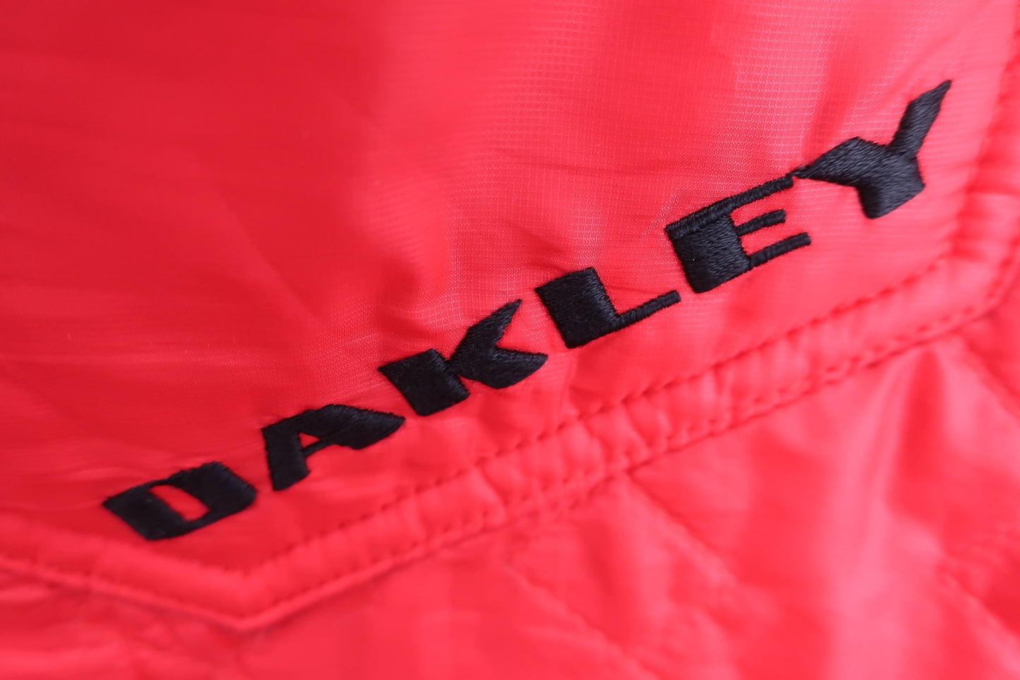 OAKLEY(オークリー) ナイロンパンツ 赤 メンズ L B-4