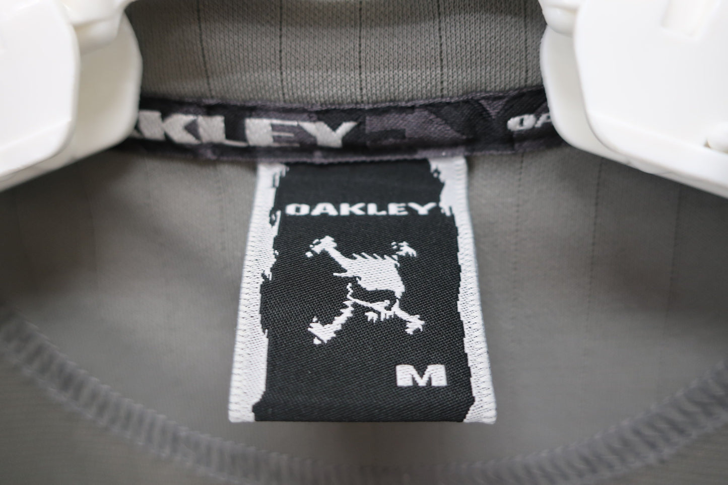 OAKLEY(オークリー) 半袖ハーフジップシャツ グレー メンズ M A-4