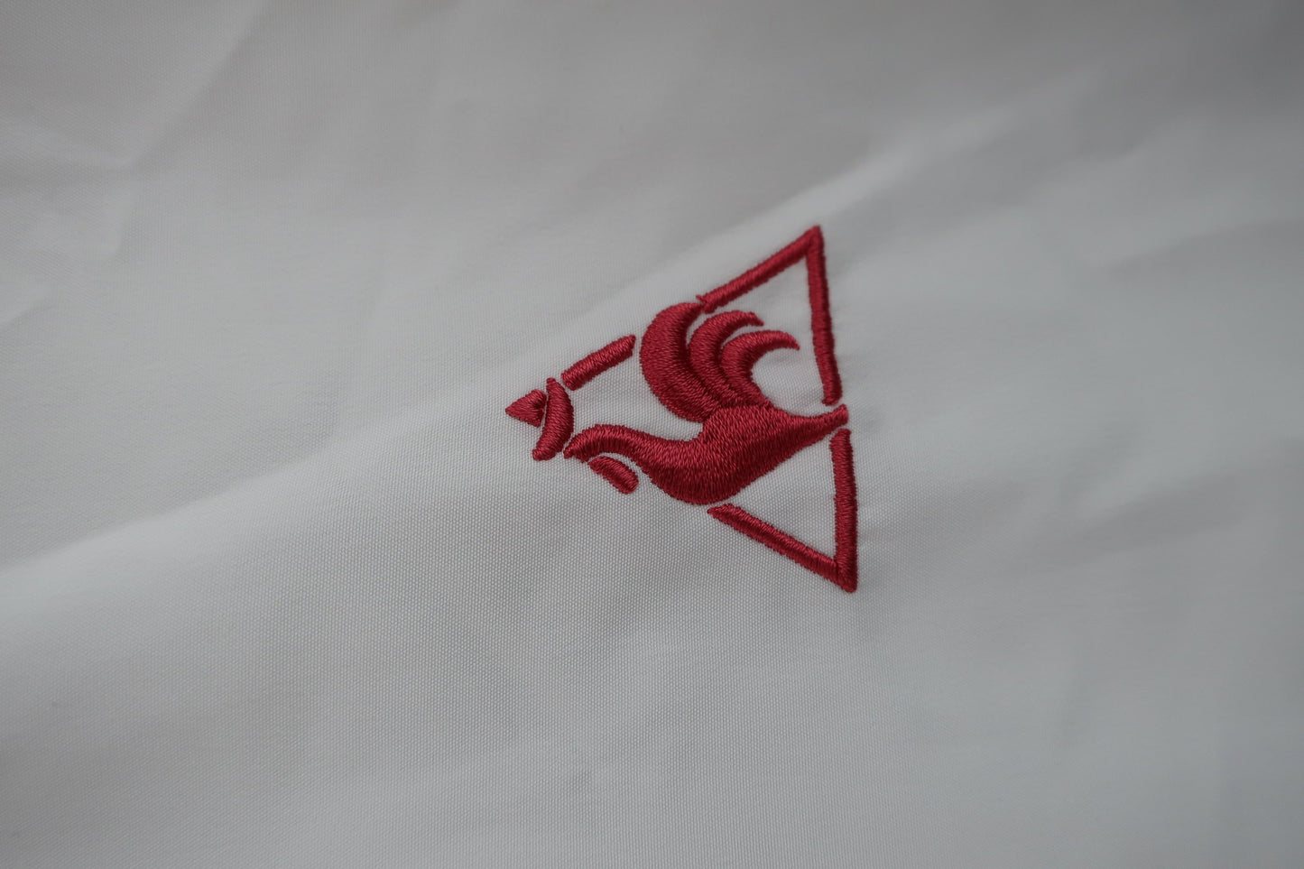 le coq sportif(ルコックスポルティフ) ウィンドブレーカー 白 レディース L A-2