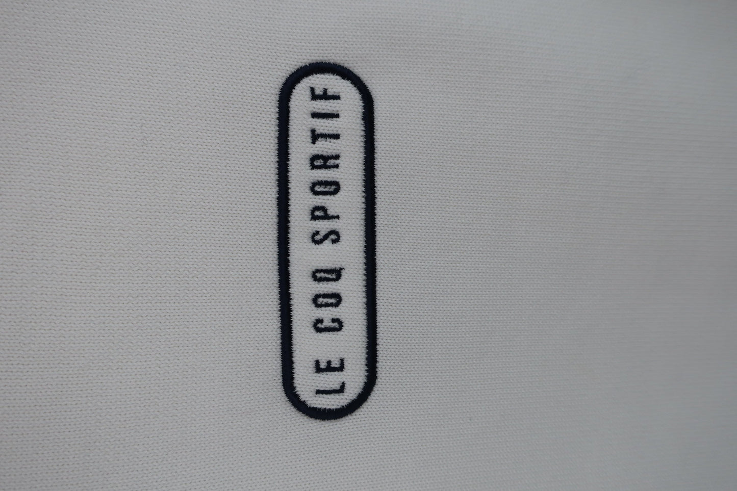 le coq sportif(ルコックスポルティフ) モックネックトレーナー 白 レディース A-2