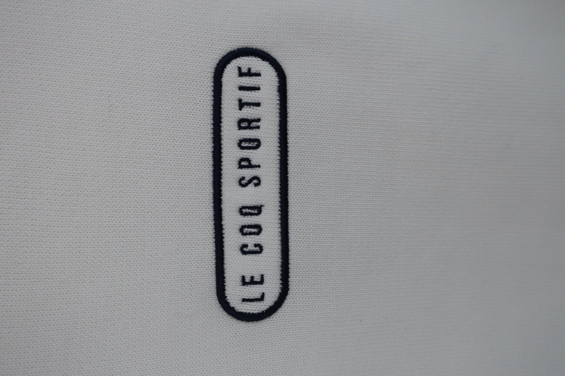 le coq sportif(ルコックスポルティフ) モックネックトレーナー 白 レディース A-2