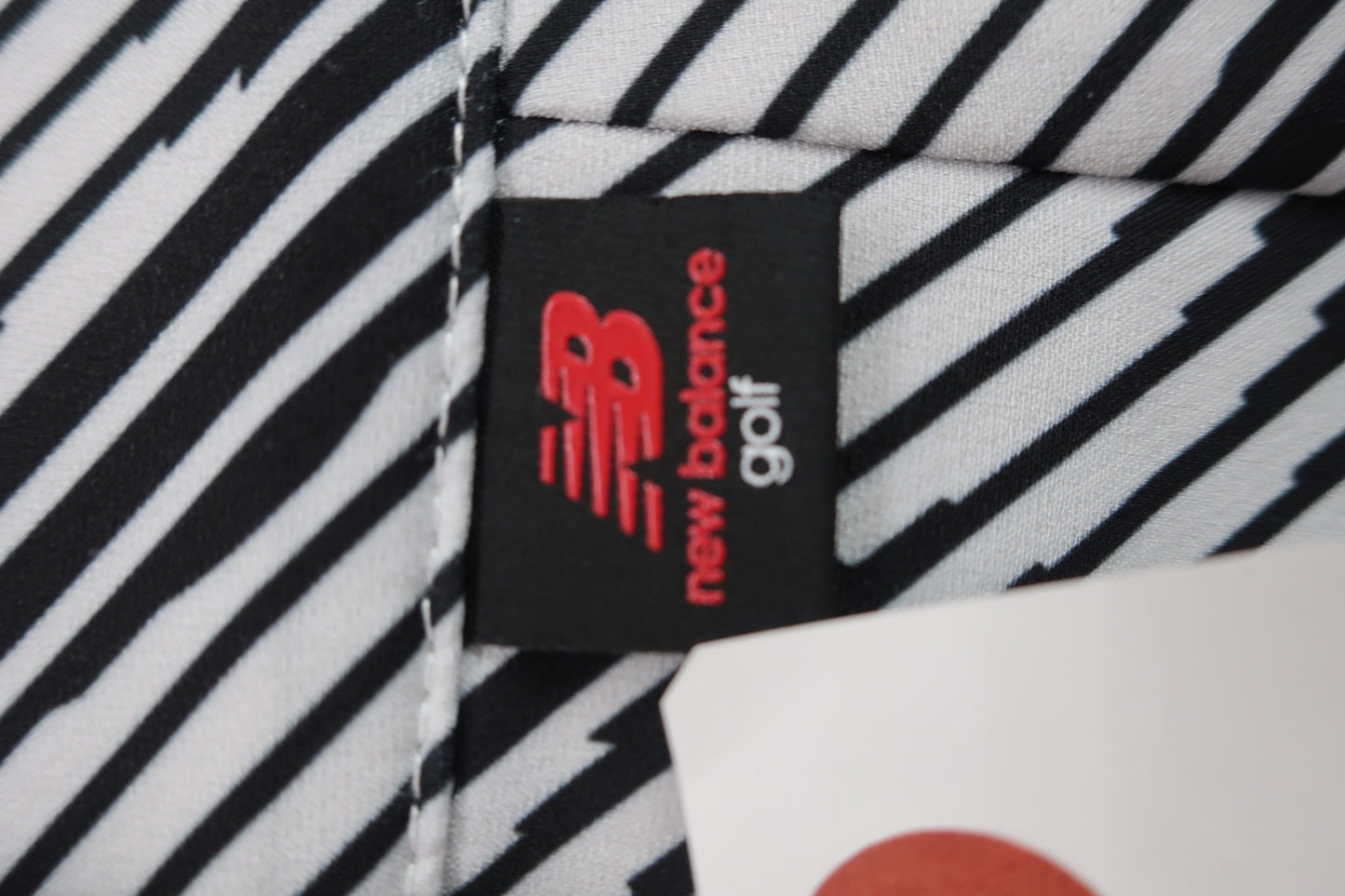 New Balance golf(ニューバランスゴルフ) スカート 白黒総柄 レディース 0 012-2234503 A-3