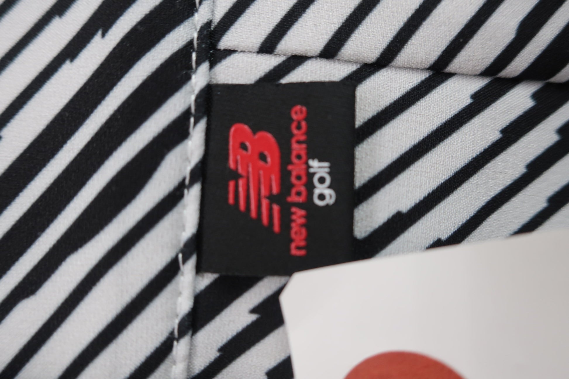 New Balance golf(ニューバランスゴルフ) スカート 白黒総柄 レディース 0 012-2234503 A-3