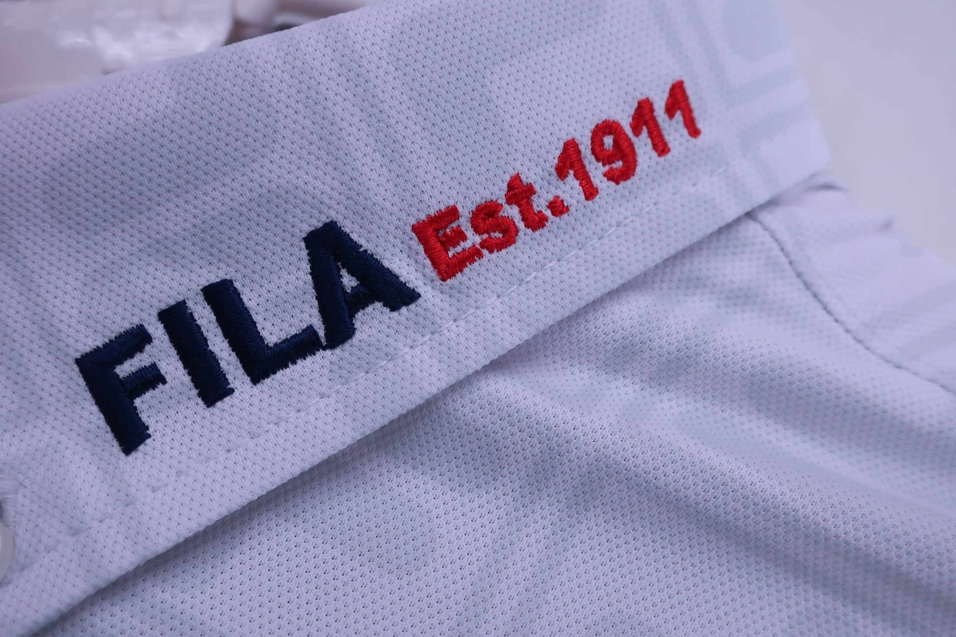 FILA GOLF(フィラゴルフ) ポロシャツ 白グレーロゴ柄 メンズ M B-5