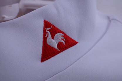 le coq sportif(ルコックスポルティフ) 半袖モックネックシャツ 白 レディース S A-4