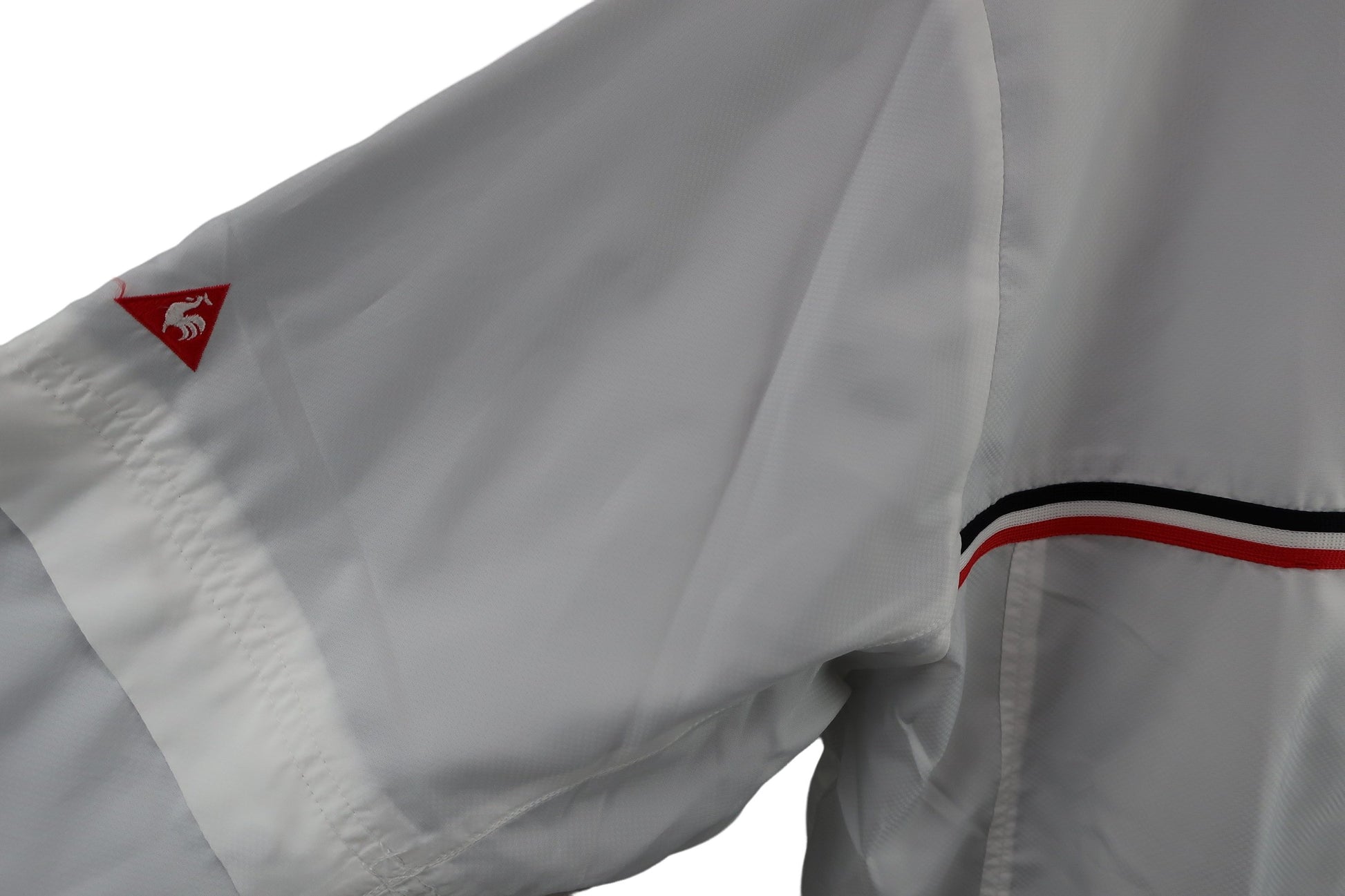 le coq sportif(ルコックスポルティフ) ウィンドブレーカー 白 メンズ LL B-3