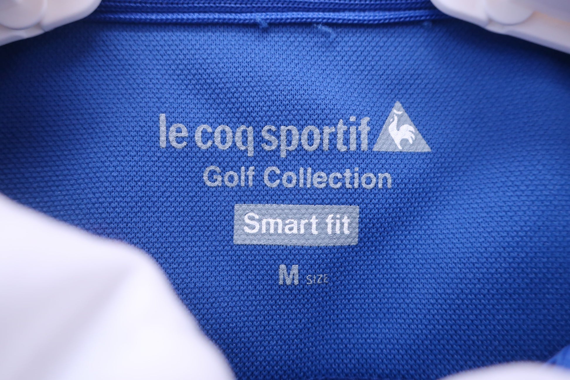 le coq sportif(ルコックスポルティフ) ハーフジップポロシャツ 青白 レディース M A-3