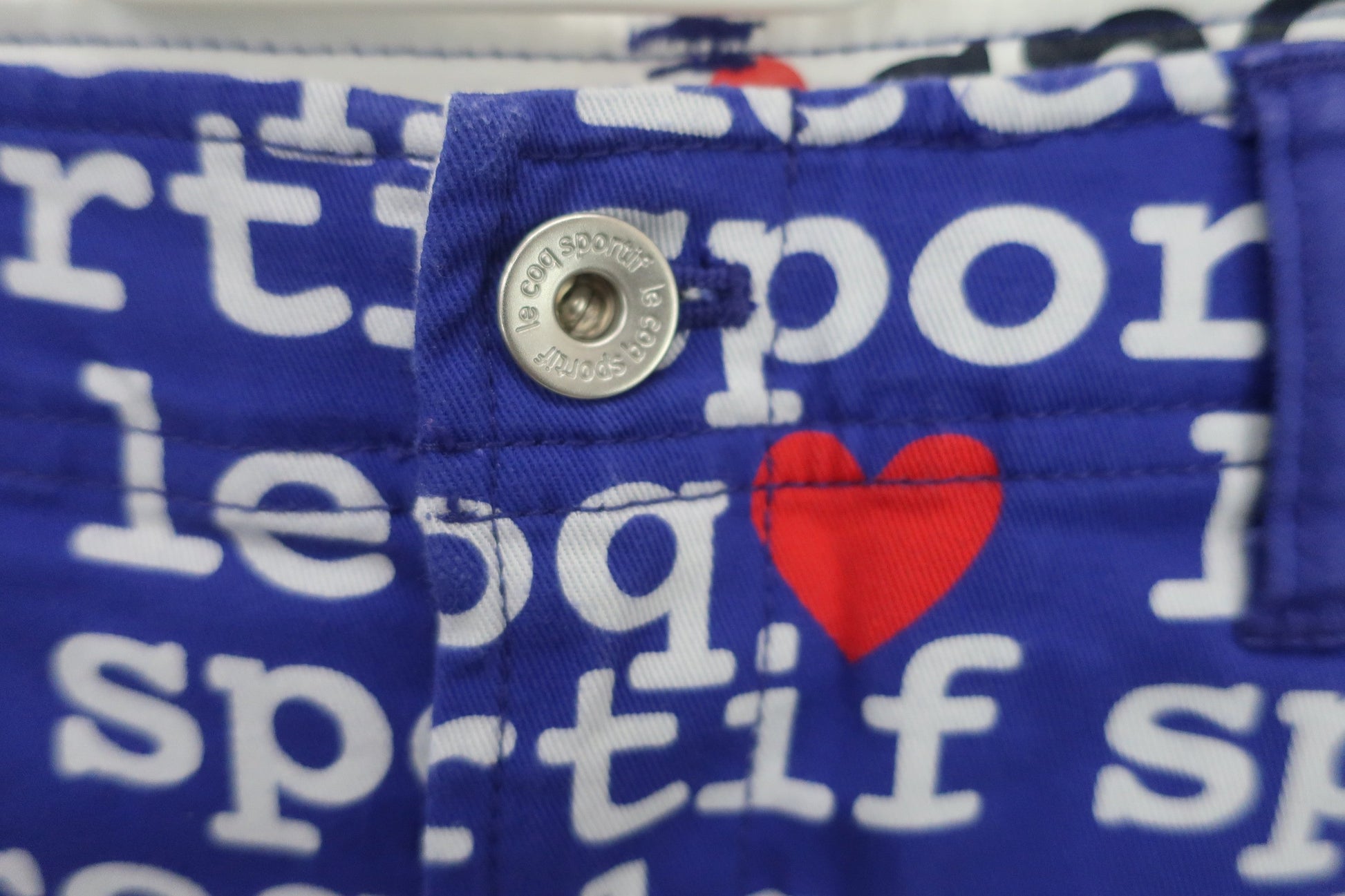 le coq sportif(ルコックスポルティフ) スカート(インナーパンツ付き) 青紫白文字柄 レディース 9 A-3