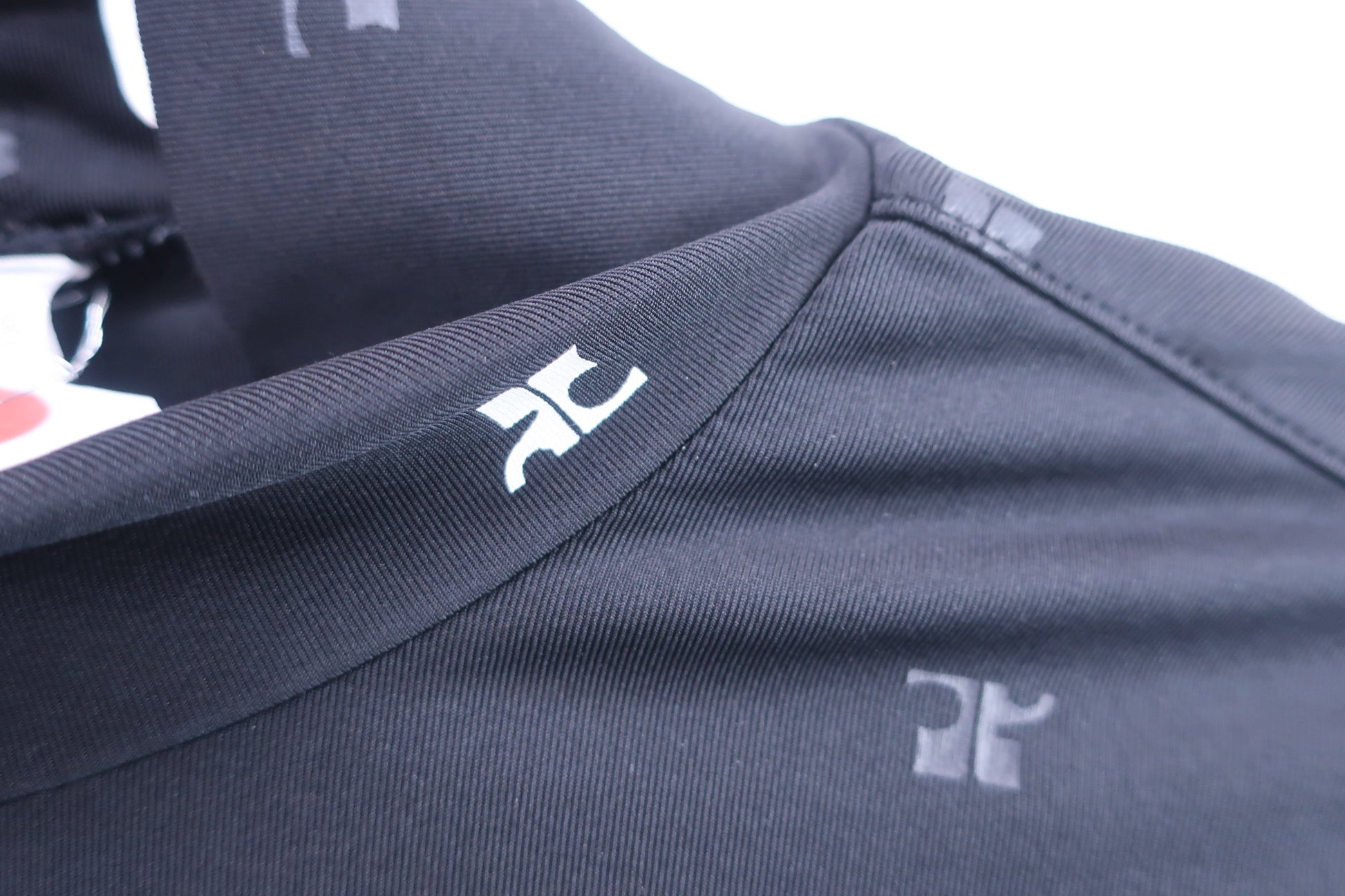 courreges(クレージュ) 長袖モックネックシャツ 黒ロゴ柄 レディース 38 A-3