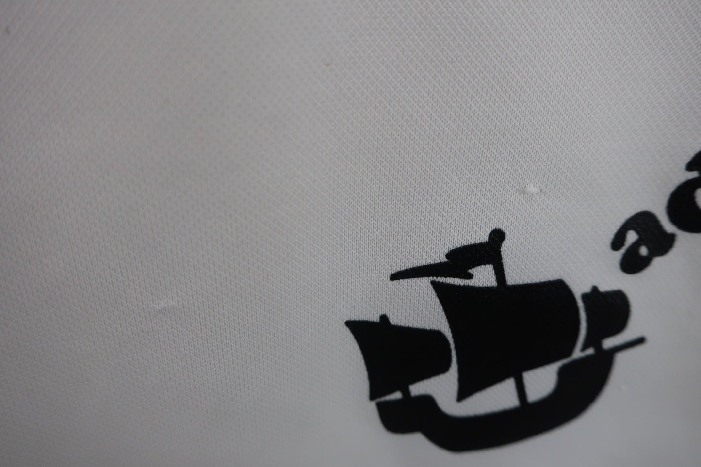 le coq sportif(ルコックスポルティフ) ハーフジップ半袖シャツ 白 レディース M C-5