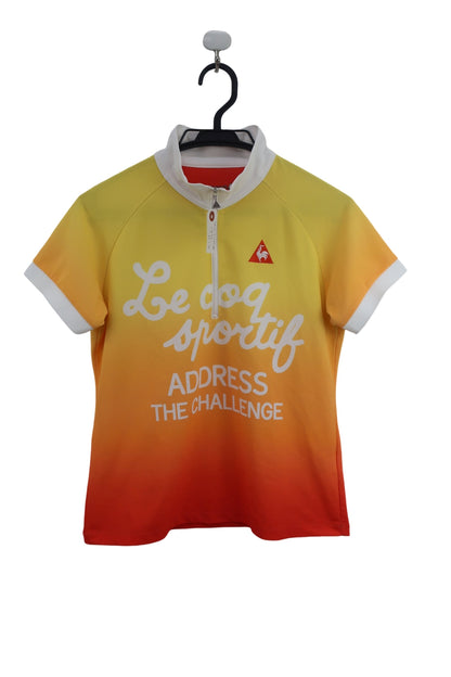 le coq sportif(ルコックスポルティフ) 半袖ハーフジップシャツ 黄色オレンジ レディース L B-1