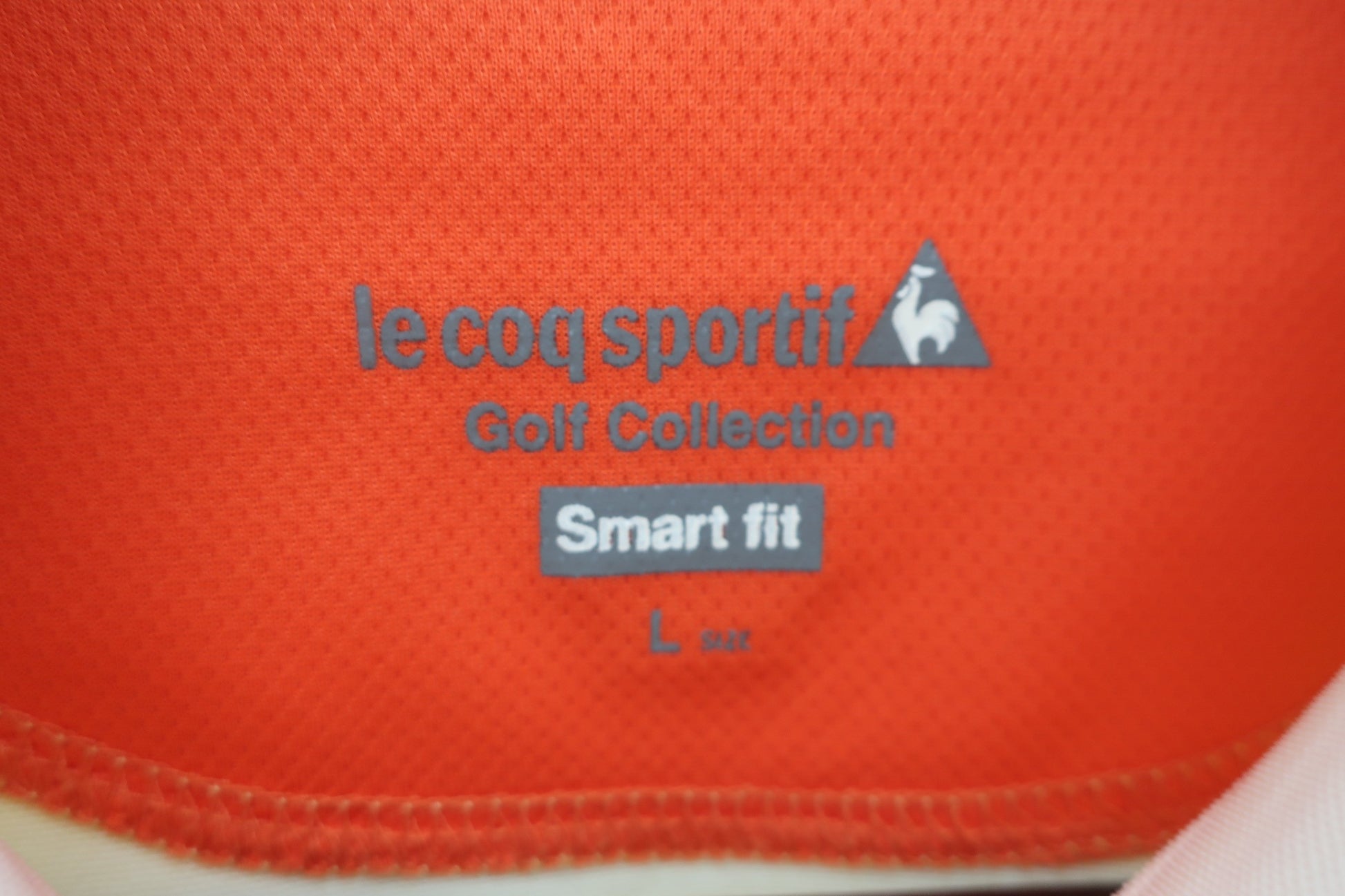 le coq sportif(ルコックスポルティフ) 半袖ハーフジップシャツ 黄色オレンジ レディース L B-3