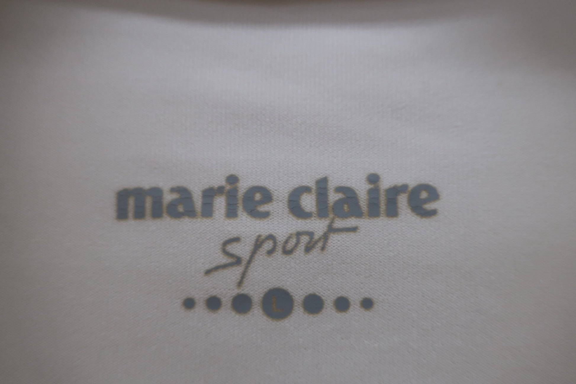 marie claire sport(マリ・クレール・スポーツ) モックネックシャツ 白 レディース L B-2