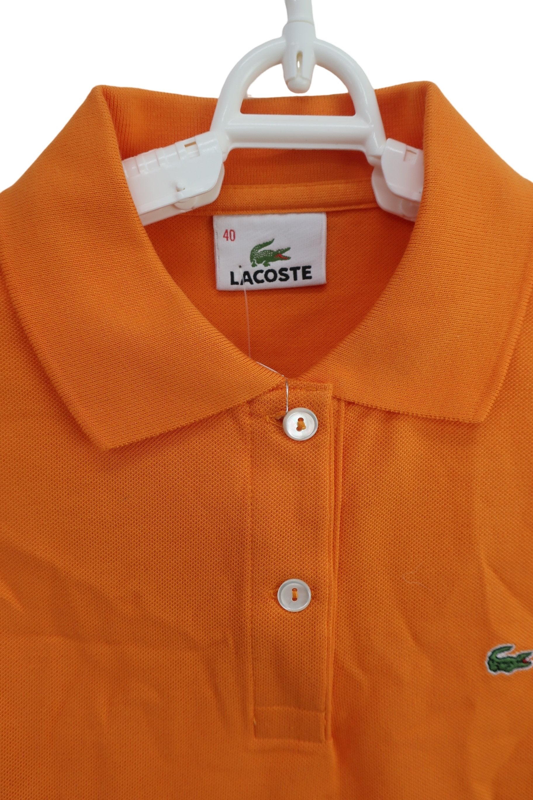 LACOSTE(ラコステ) ノースリーブポロシャツ オレンジ レディース 40 N