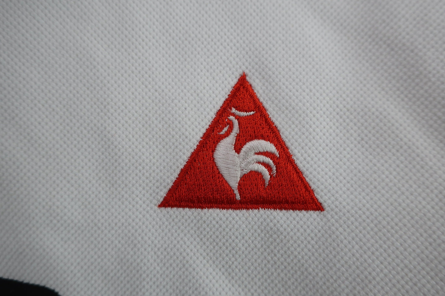le coq sportif(ルコックスポルティフ) 長袖ハーフジップシャツ 白黒 レディース M A