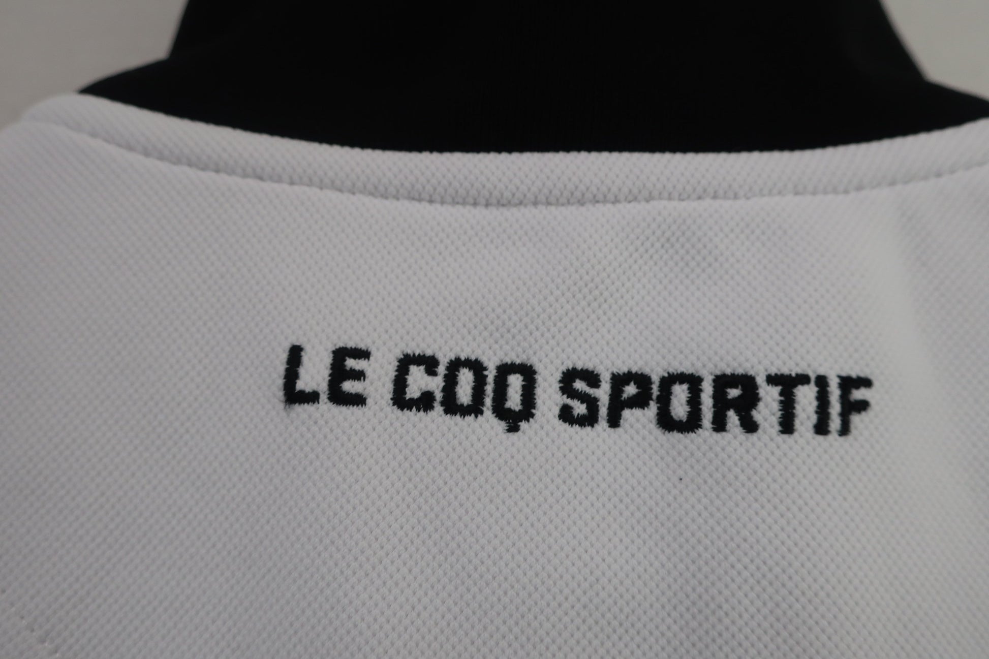 le coq sportif(ルコックスポルティフ) 長袖ハーフジップシャツ 白黒 レディース M A