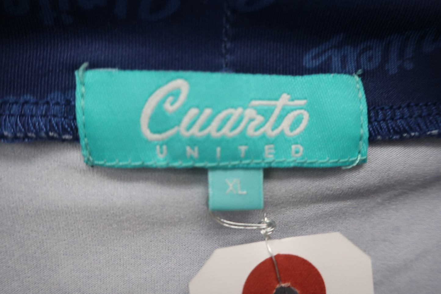 Cuarto UNITED(クアルトユナイテッド) 半袖モックネックシャツ 青ロゴ柄 レディース XL A