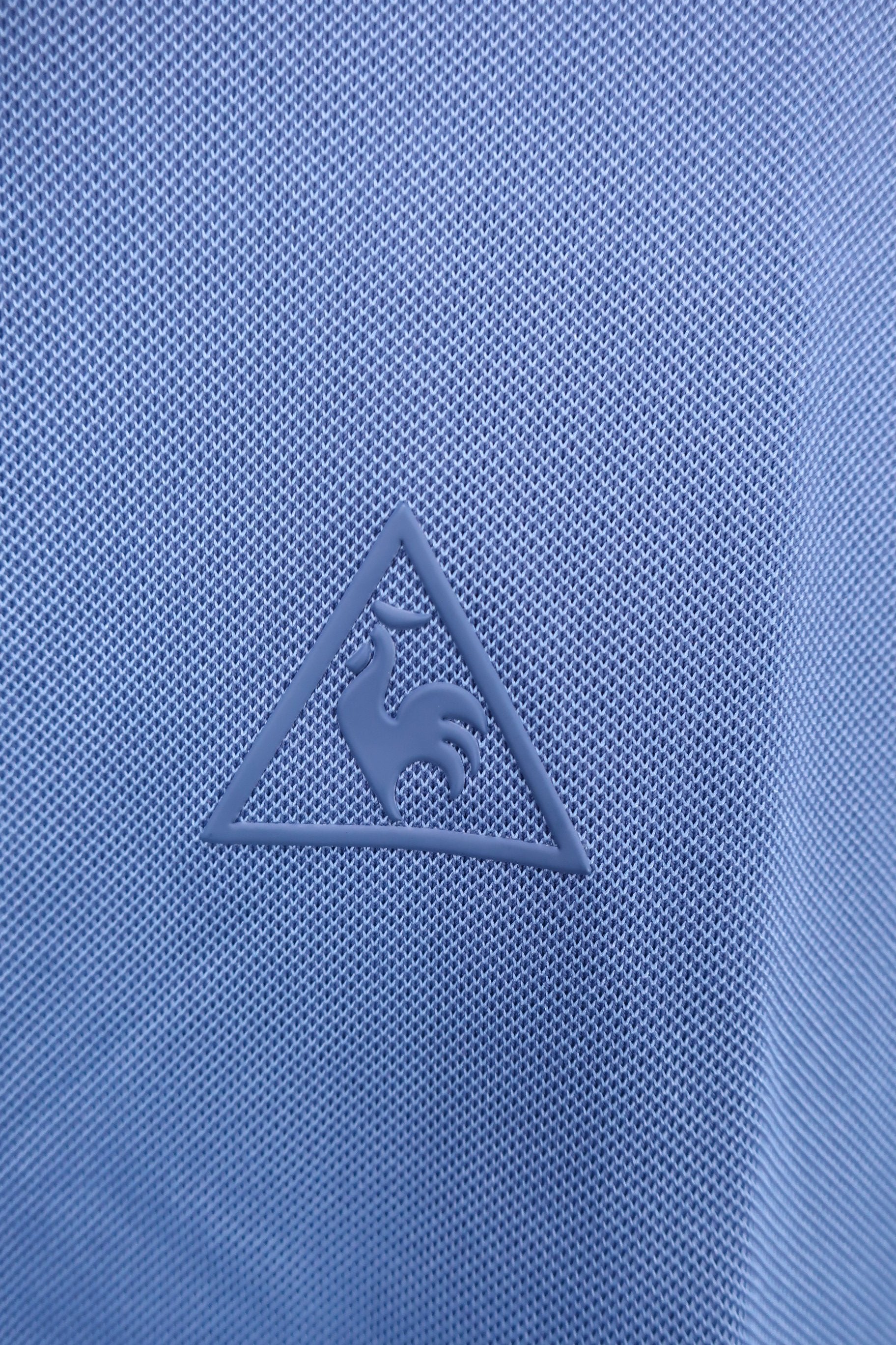 le coq sportif(ルコックスポルティフ) ポロシャツ 青 レディース L N