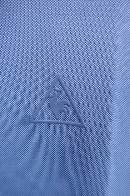 le coq sportif(ルコックスポルティフ) ポロシャツ 青 レディース L N