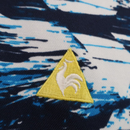 le coq sportif(ルコックスポルティフ) ポロシャツ 青系総柄 メンズ LL A