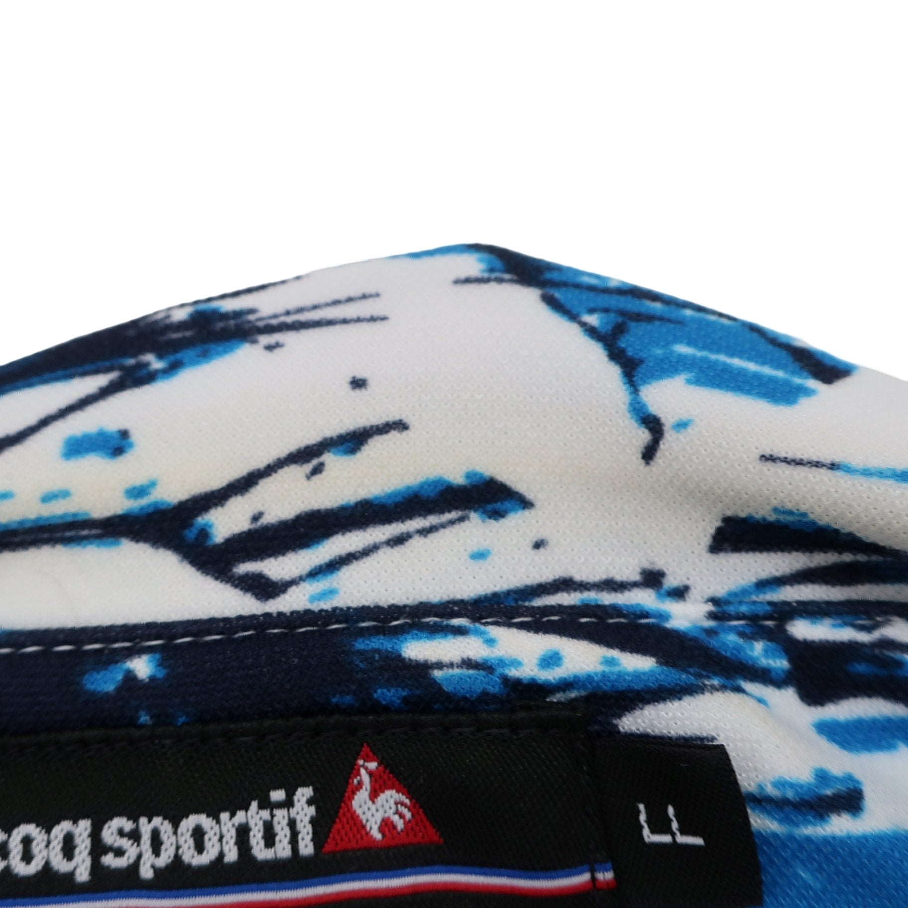 le coq sportif(ルコックスポルティフ) ポロシャツ 青系総柄 メンズ LL A