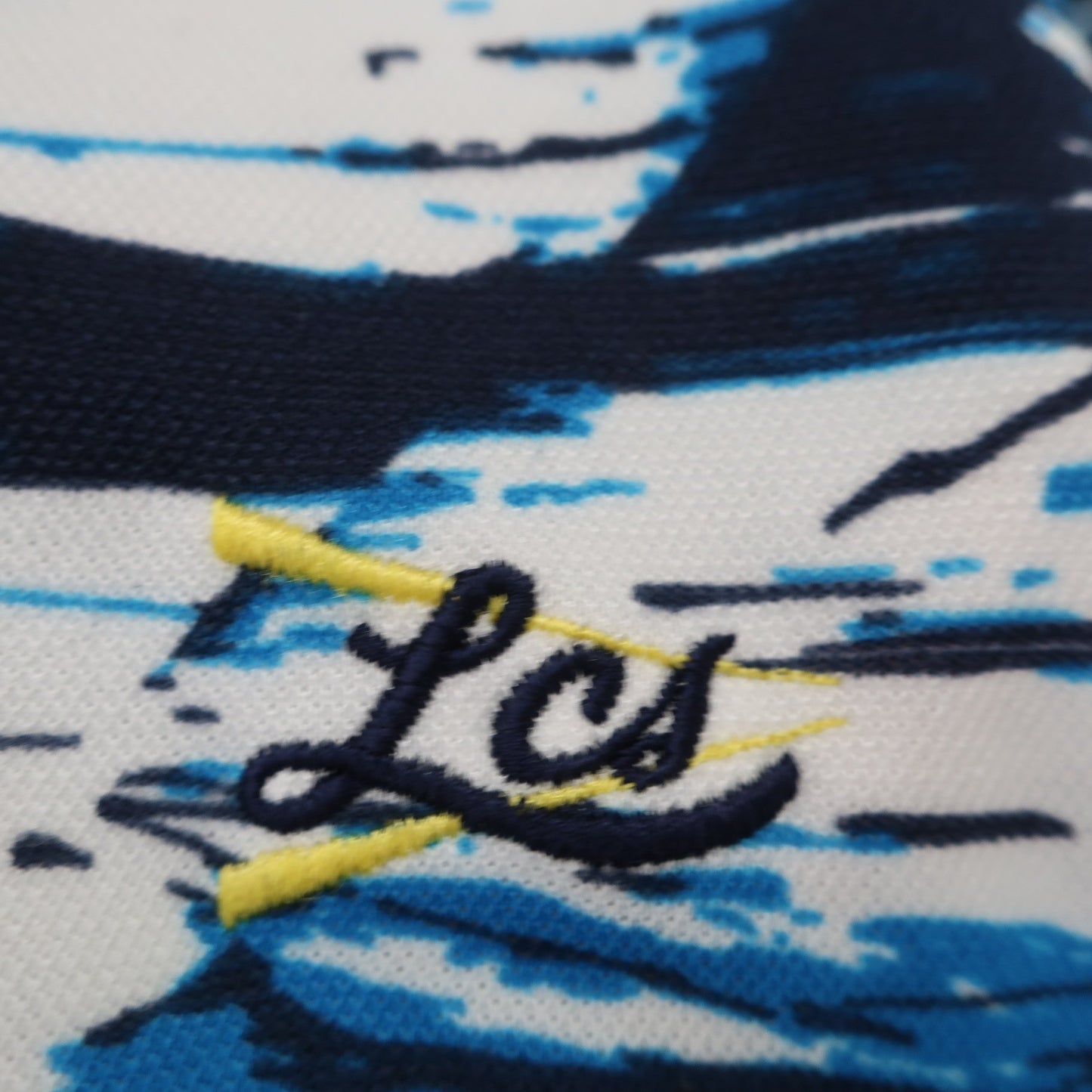 le coq sportif(ルコックスポルティフ) ポロシャツ 青系総柄 メンズ LL A