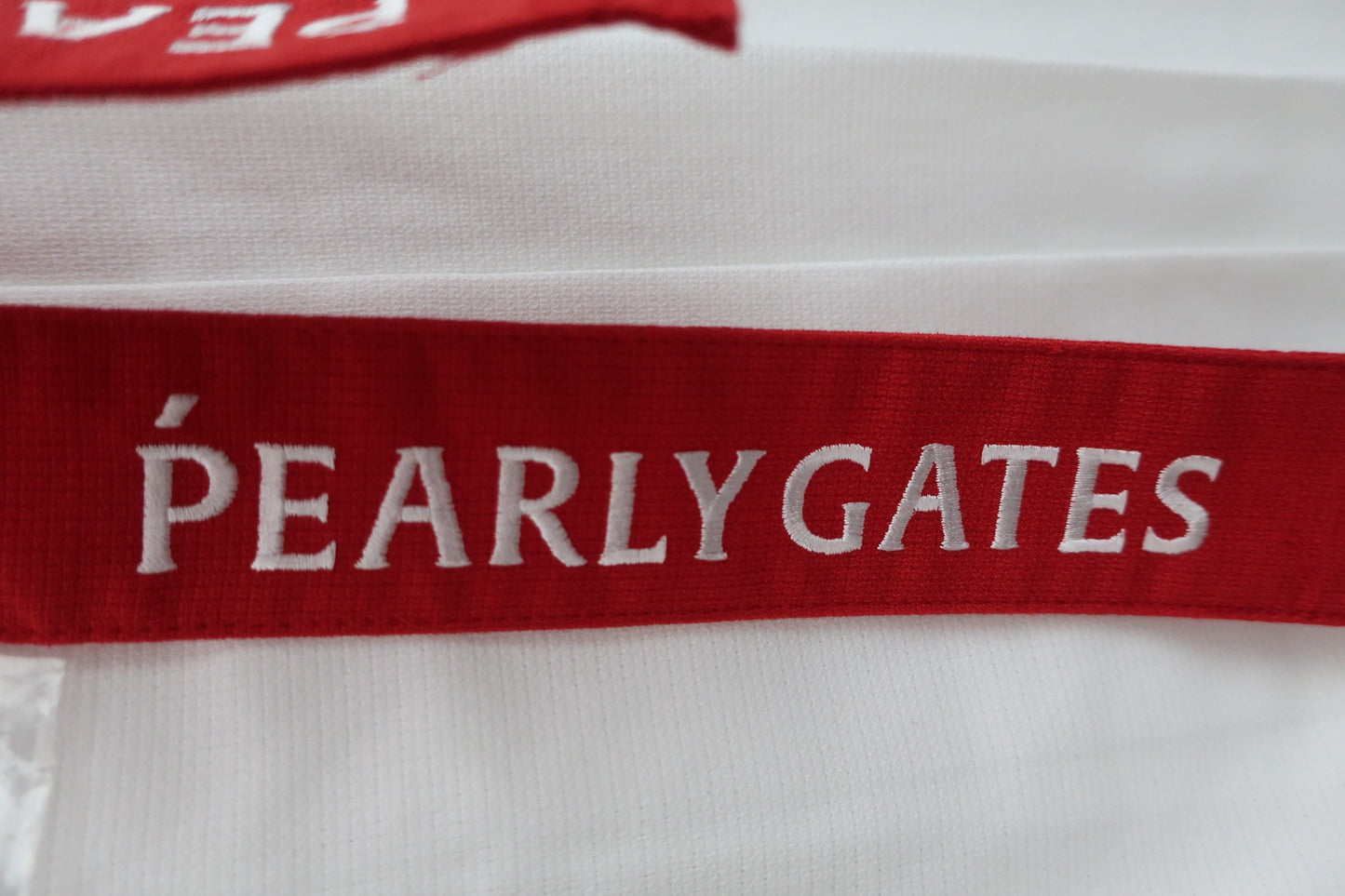 PEARLY GATES(パーリーゲイツ) ストレッチミモレミドルスカート 白赤 レディース 1 055-2134312 N