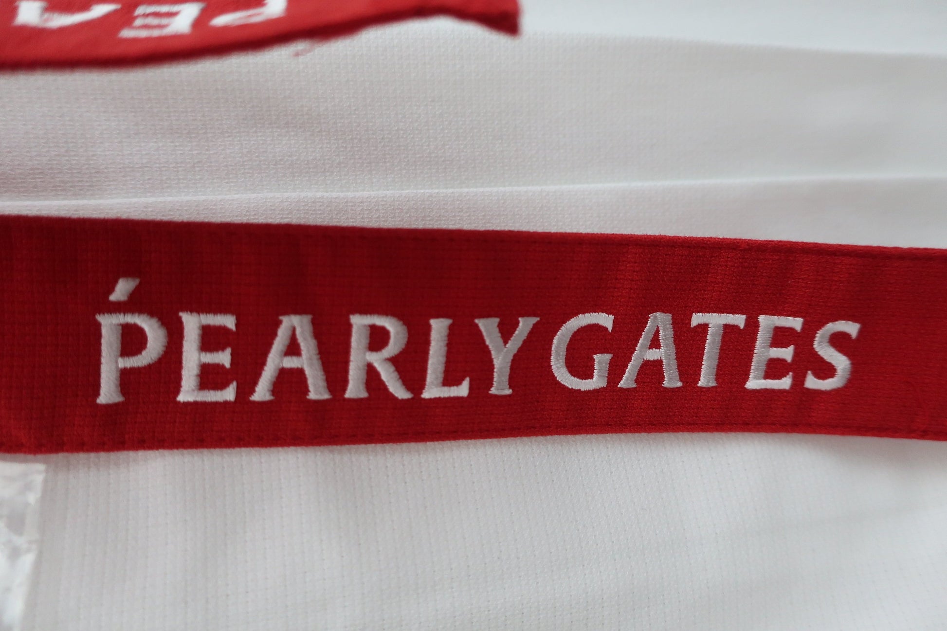PEARLY GATES(パーリーゲイツ) ストレッチミモレミドルスカート 白赤 レディース 1 055-2134312 N