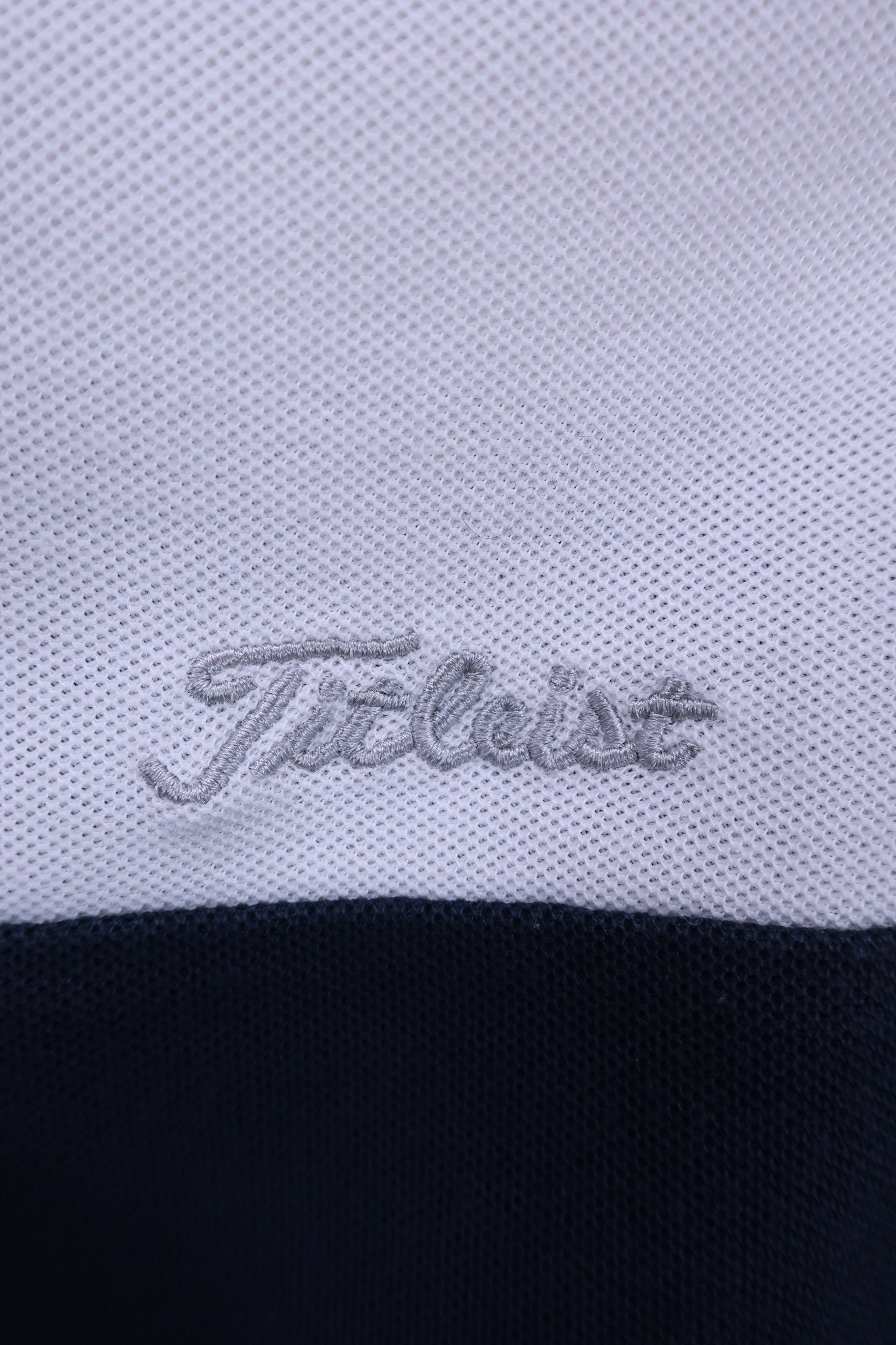 Titleist(タイトリスト) ノースリーブポロシャツ 白ネイビー レディース LL B
