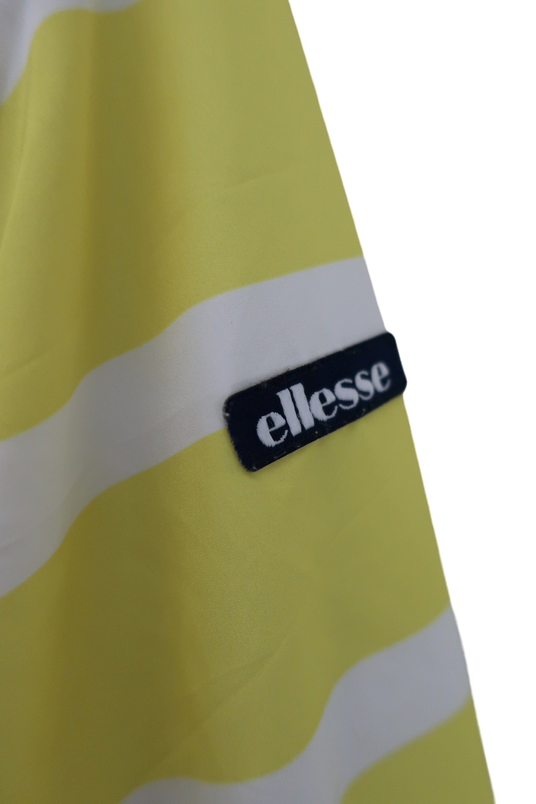 ellesse(エレッセ) ウィンドブレーカー 黄色白ボーダー レディース L B