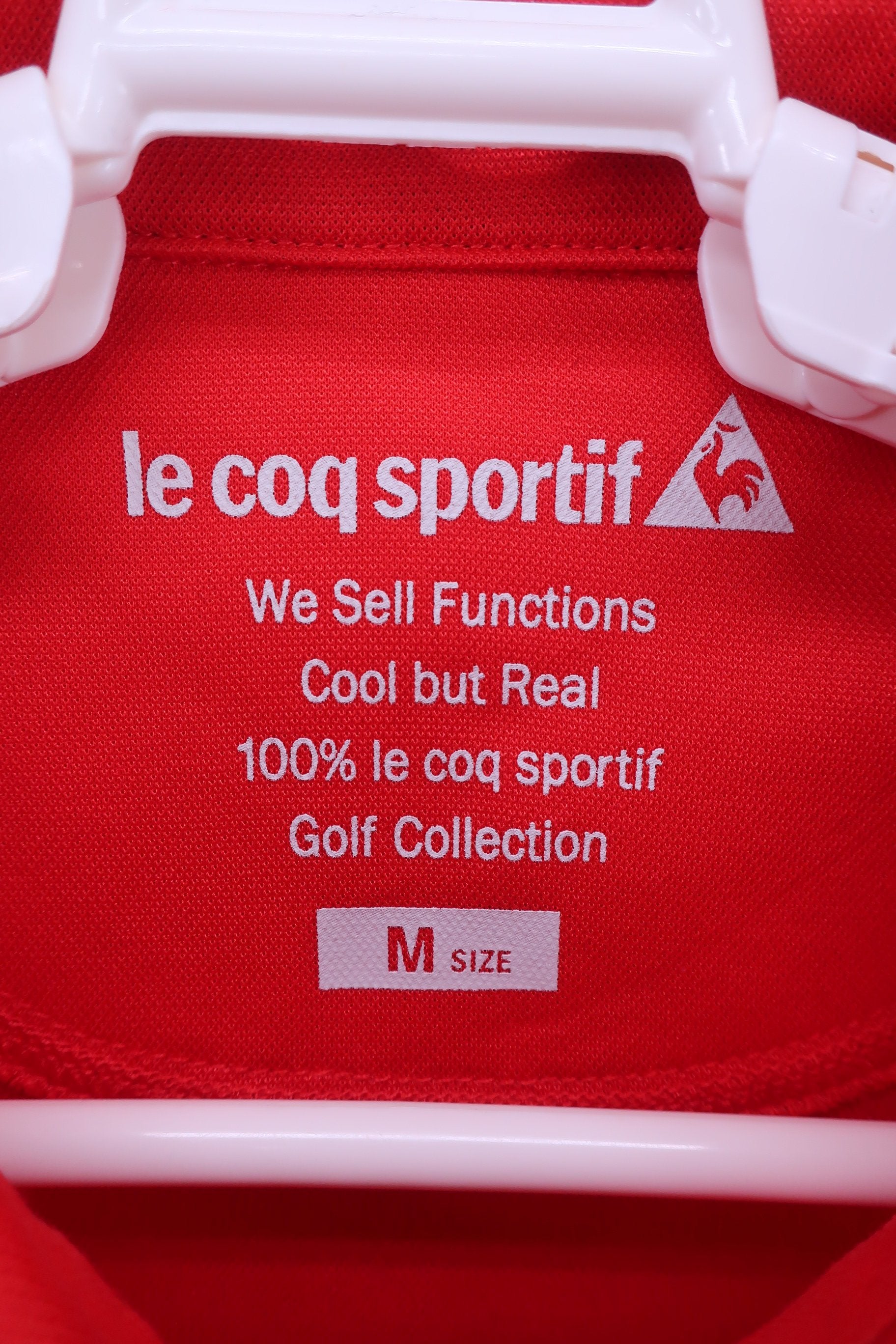le coq sportif(ルコックスポルティフ) ポロシャツ 赤 レディース M A