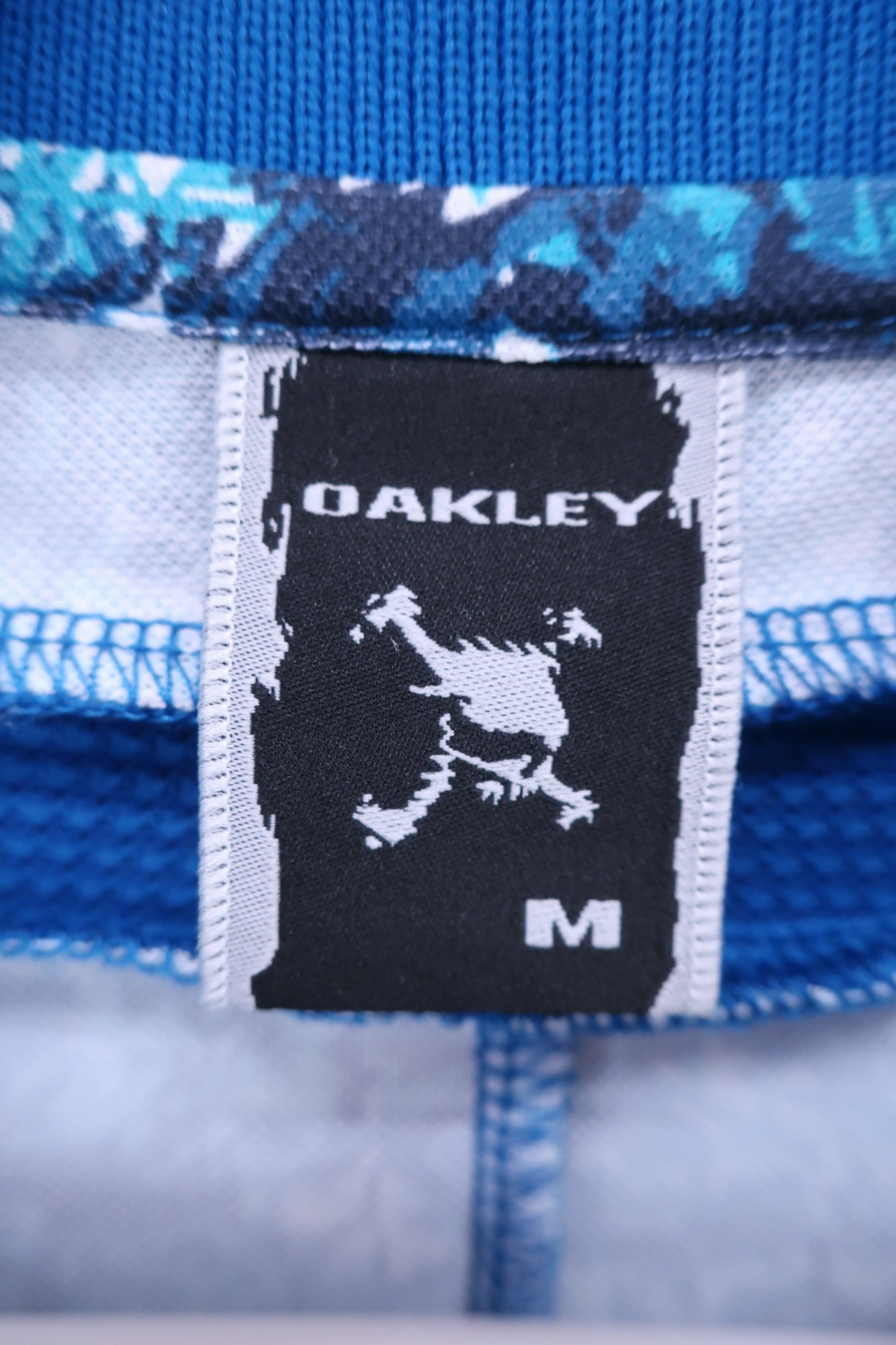 OAKLEY(オークリー) ポロシャツ 青総柄 メンズ M A