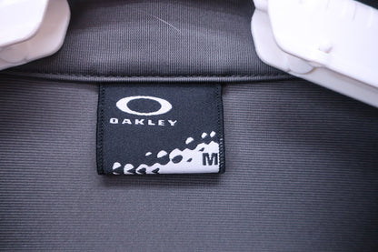OAKLEY(オークリー) 長袖ハーフジップシャツ グレー メンズ M B