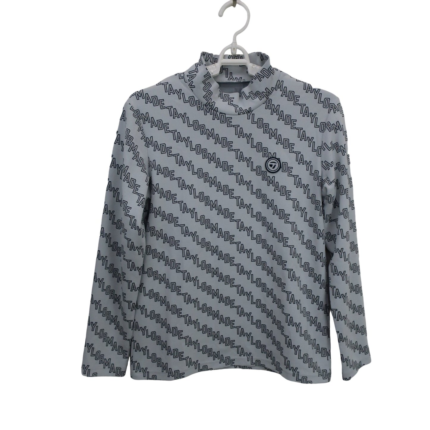 TaylorMade(テーラーメイド) 長袖モックネックシャツ グレーロゴ文字柄 レディース M A