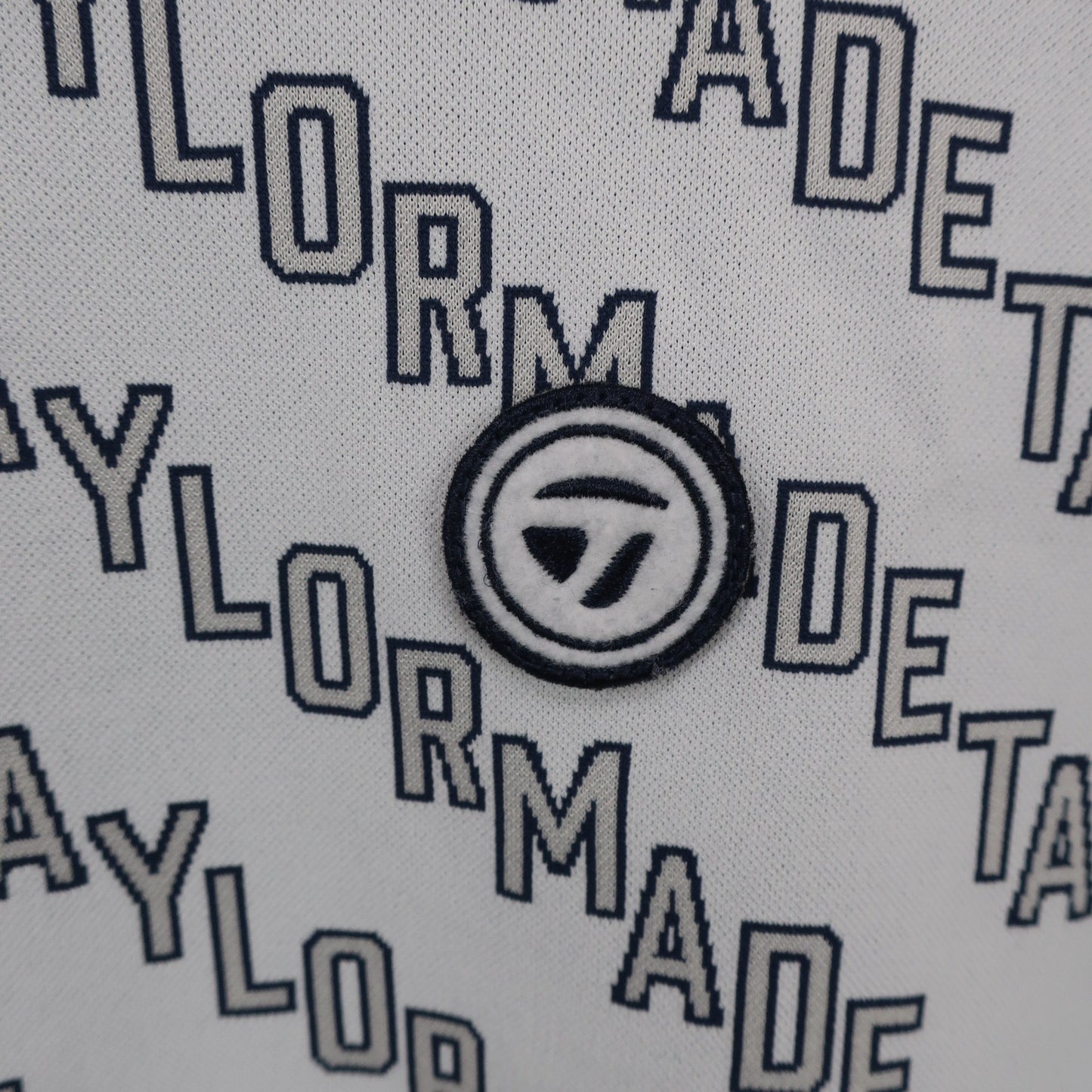 TaylorMade(テーラーメイド) 長袖モックネックシャツ グレーロゴ文字柄 レディース M A