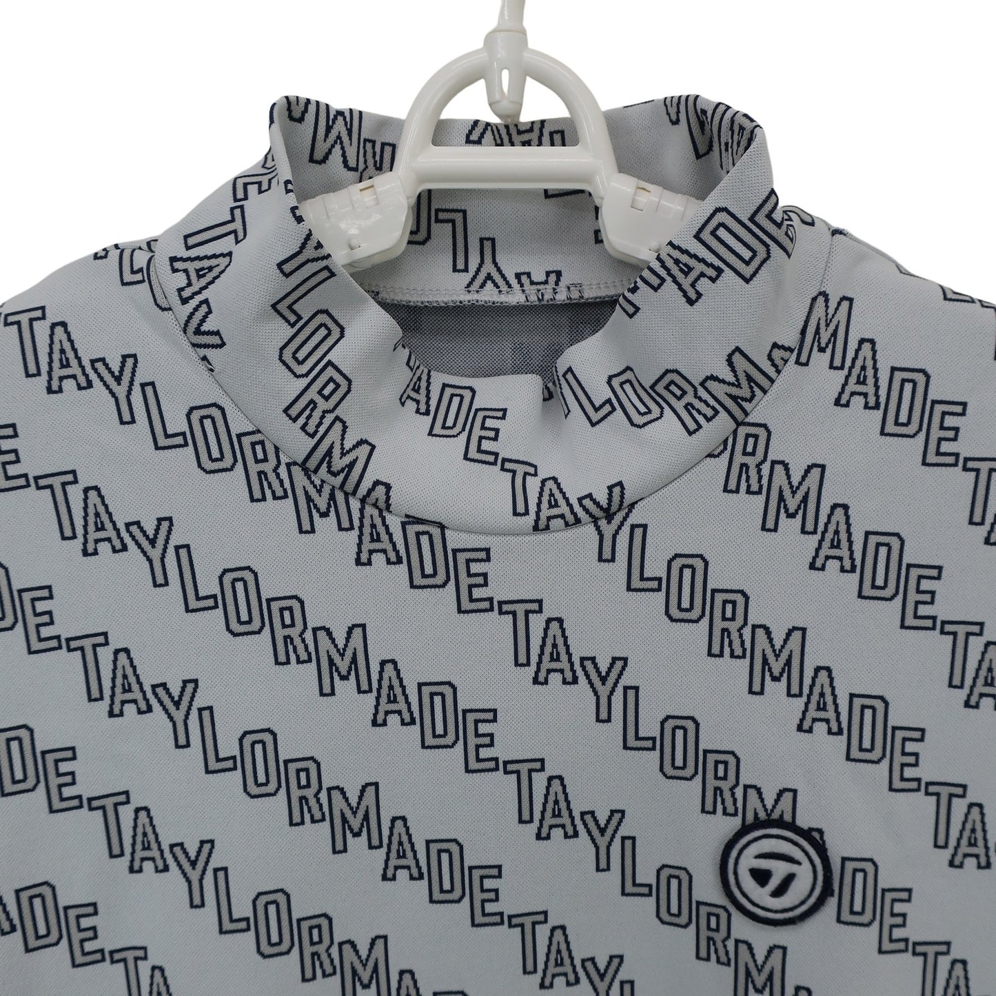 TaylorMade(テーラーメイド) 長袖モックネックシャツ グレーロゴ文字柄 レディース M A